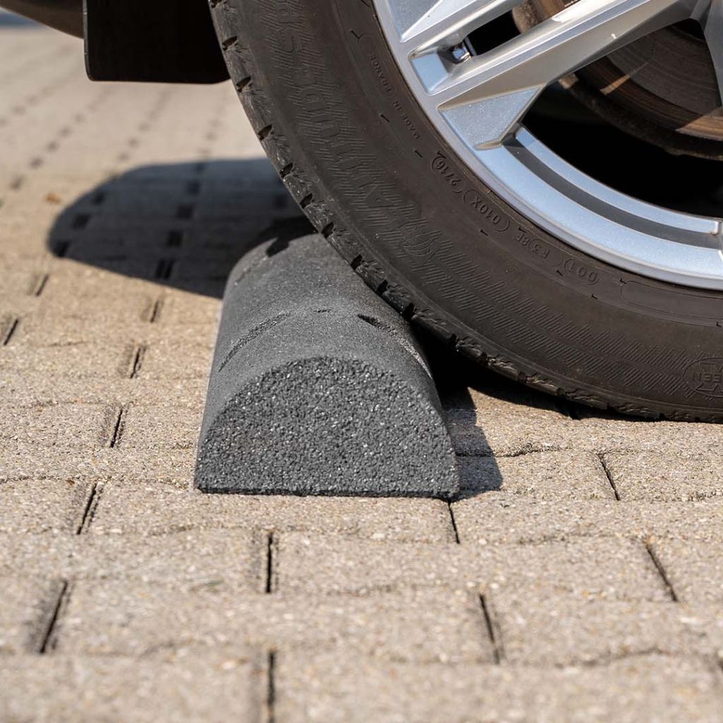 The tire is stopped at the rubber bump stop.